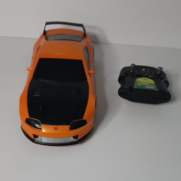 Jada Toys JDM Tuners Orange 1995 Toyota Supra R/C - Picture 2 of 9